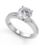 Load image into Gallery viewer, Alexandria Channel Set 4 Prong Round Cut Diamond Engagement Ring - Nivetta