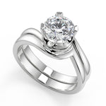 Load image into Gallery viewer, Alma Bezel Set Twist Solitaire Round Cut Diamond Engagement Ring - Nivetta