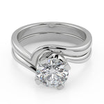 Load image into Gallery viewer, Alma Bezel Set Twist Solitaire Round Cut Diamond Engagement Ring - Nivetta