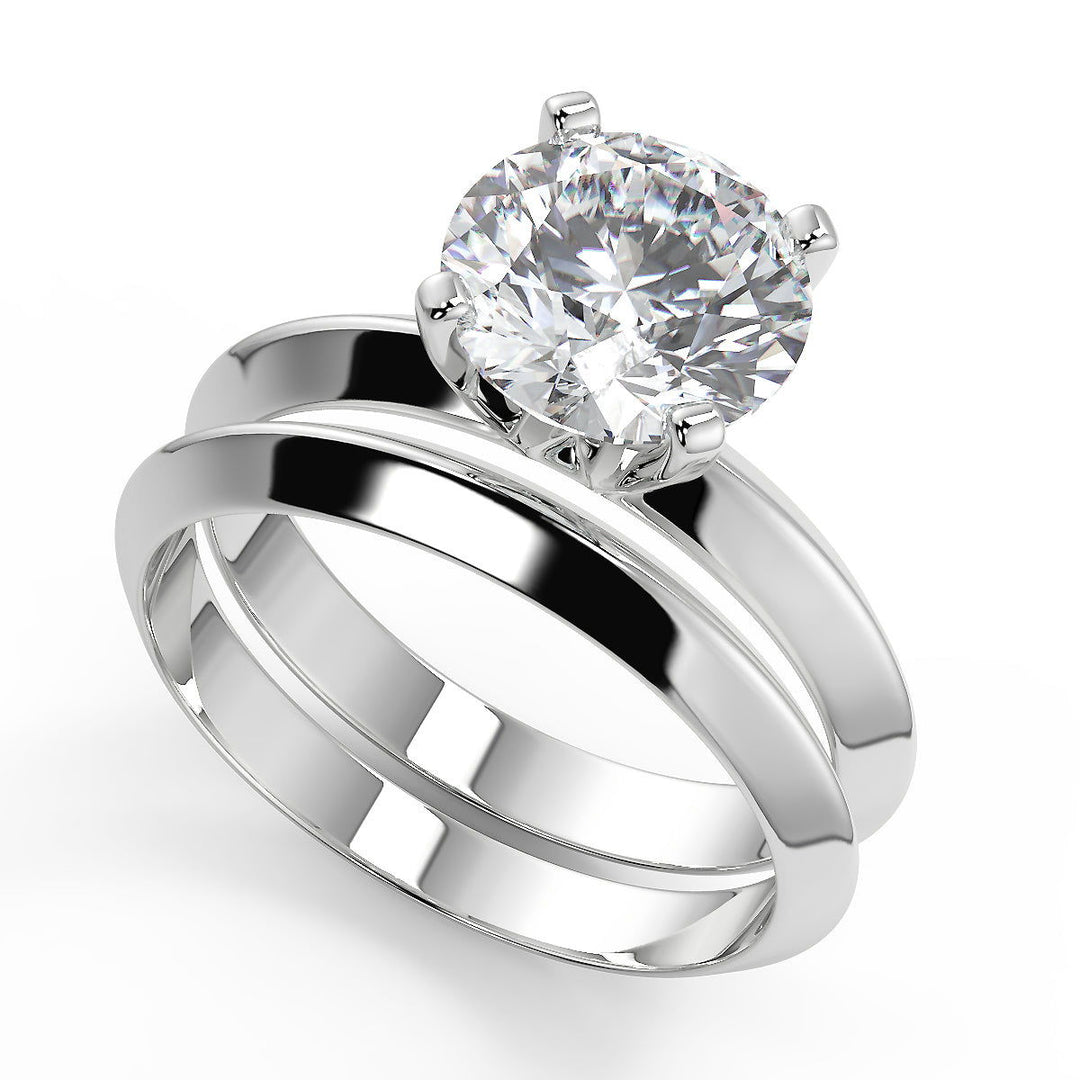 Amara Knife Edge 4 Prong Solitaire Round Cut Diamond Engagement Ring - Nivetta