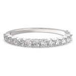 Load image into Gallery viewer, Amaranta Round Cut Diamond Bangle Bracelet Shared Prong Hinged (8 ctw) - Nivetta