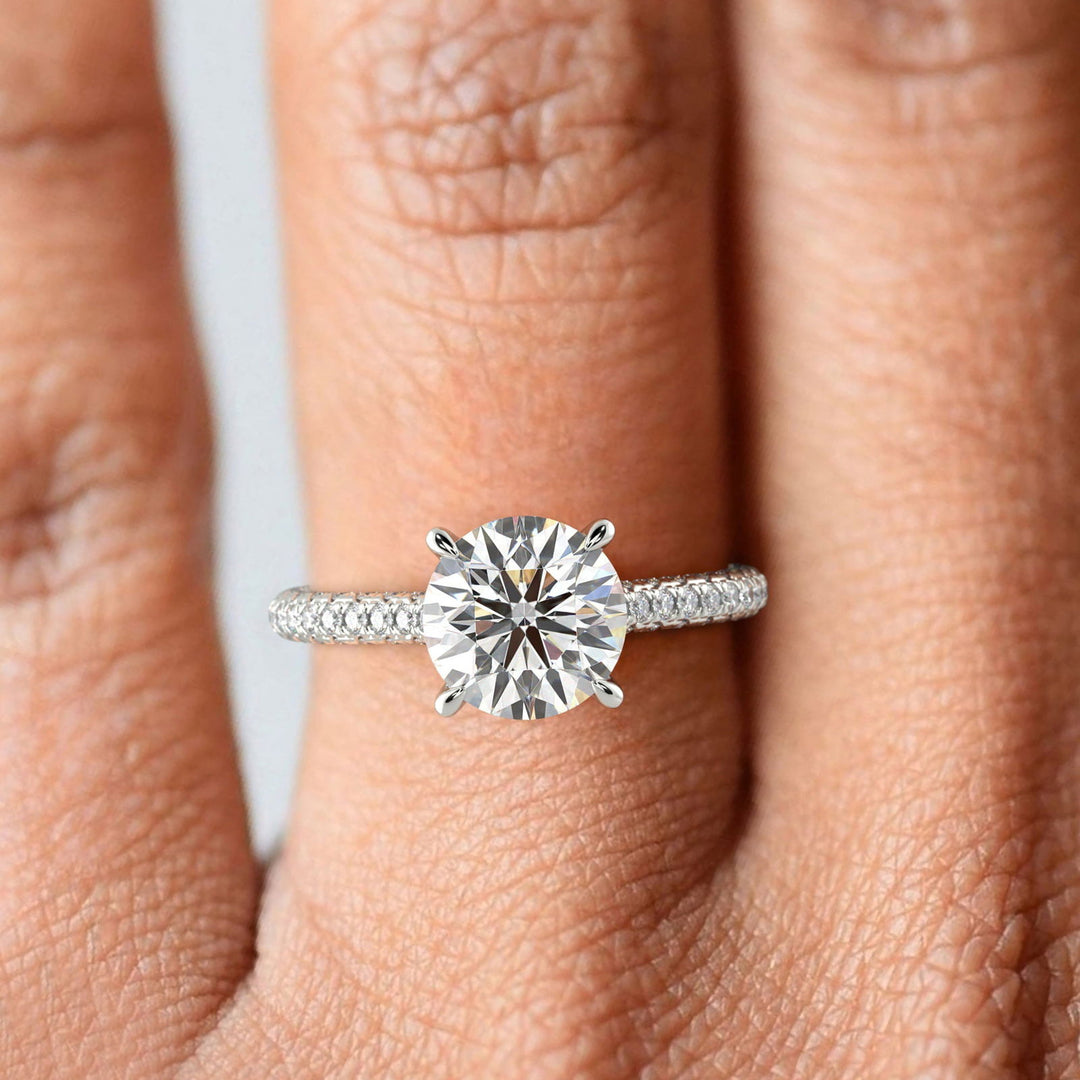 Emilia Round Cut Hidden Halo 4 Prong Claw Set Engagement Ring - Nivetta