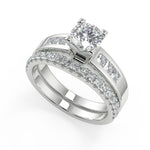 Load image into Gallery viewer, Isabel Four Prong Channel Set Round Cut Diamond Engagement Ring - Nivetta