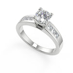 Load image into Gallery viewer, Isabel Four Prong Channel Set Round Cut Diamond Engagement Ring - Nivetta