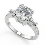 Load image into Gallery viewer, Maggie Baguette Accents 3 Stone Round Cut Double Prong Ring - Nivetta
