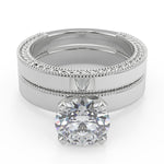 Load image into Gallery viewer, Micaela Hand Carved Milgrain Solitaire Round Cut Diamond Engagement Ring - Nivetta