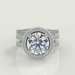 Load and play video in Gallery viewer, Norah Split Shank Pave Halo Round Cut Diamond Engagement Ring
