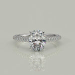 Load and play video in Gallery viewer, Emilia Oval Cut Pave Hidden Halo 4 Prong Claw Engagement Ring