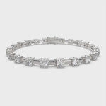 Load and play video in Gallery viewer, Brunhilde Round Cut Diamond Tennis Bracelet Prong Set (6 ctw)