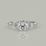 Load and play video in Gallery viewer, Carissa Round Cut Pave Shared Prong Claw Set Engagement Ring Setting