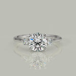 Load and play video in Gallery viewer, Juliet Round Cut Trilogy Pave 4 Prong Claw Set Engagement Ring Setting