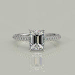 Load and play video in Gallery viewer, Emilia Emerald Cut Pave Halo 4 Prong Claw Set Engagement Ring
