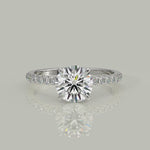 Load and play video in Gallery viewer, Pauline Round Cut Pave Hidden Halo 4 Prong Claw Set Engagement Ring Setting
