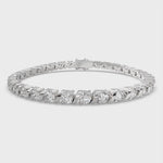 Load and play video in Gallery viewer, Cassiopeia Round Cut Diamond Tennis Bracelet S-Link (6 ctw)