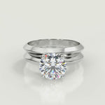 Load and play video in Gallery viewer, Amara Knife Edge 4 Prong Solitaire Round Cut Diamond Engagement Ring