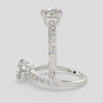 Load and play video in Gallery viewer, Lavinia Round Cut Side Stone 4 Prong Engagement Ring Setting