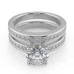 Load image into Gallery viewer, Alexandria Channel Set 4 Prong Round Cut Diamond Engagement Ring - Nivetta

