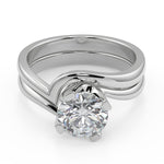 Load image into Gallery viewer, Alma Bezel Set Twist Solitaire Round Cut Diamond Engagement Ring - Nivetta
