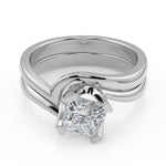 Load image into Gallery viewer, Elaine Bezel Set Twist Solitaire Princess Cut Diamond Engagement Ring - Nivetta

