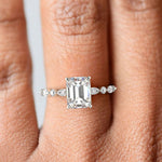 Load image into Gallery viewer, Julija Emerald Cut Hidden Halo Shared Prong Engagement Ring - Nivetta
