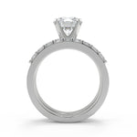 Load image into Gallery viewer, Karsyn Shared Prong Assher Accents 4 Prong Round Diamond Ring - Nivetta
