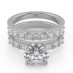 Load image into Gallery viewer, Karsyn Shared Prong Assher Accents 4 Prong Round Diamond Ring - Nivetta
