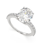 Load image into Gallery viewer, Lavinia Oval Cut Side Stone 4 Prong Engagement Ring Setting - Nivetta
