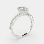 Load image into Gallery viewer, Lavinia Pear Cut Side Stone 4 Prong Engagement Ring Setting - Nivetta
