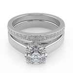 Load image into Gallery viewer, Olivia 4 Prong Solitaire Round Cut Diamond Engagement Ring - Nivetta
