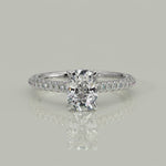 Load and play video in Gallery viewer, Emilia Cushion Cut Hidden Halo 4 Prong Claw Set Engagement Ring

