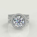 Load and play video in Gallery viewer, Norah Split Shank Pave Halo Round Cut Diamond Engagement Ring
