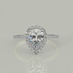Load and play video in Gallery viewer, Catalina Pear Cut Pave Halo 4 Prong Claw Set Engagement Ring
