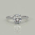 Load and play video in Gallery viewer, Emilia Oval Cut Pave Hidden Halo 4 Prong Claw Engagement Ring
