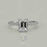 Load and play video in Gallery viewer, Emilia Emerald Cut Pave Halo 4 Prong Claw Set Engagement Ring
